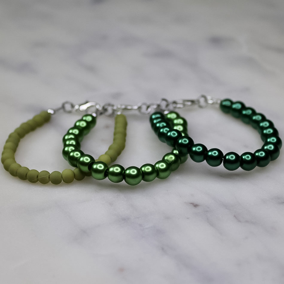 Olive green glass pearl