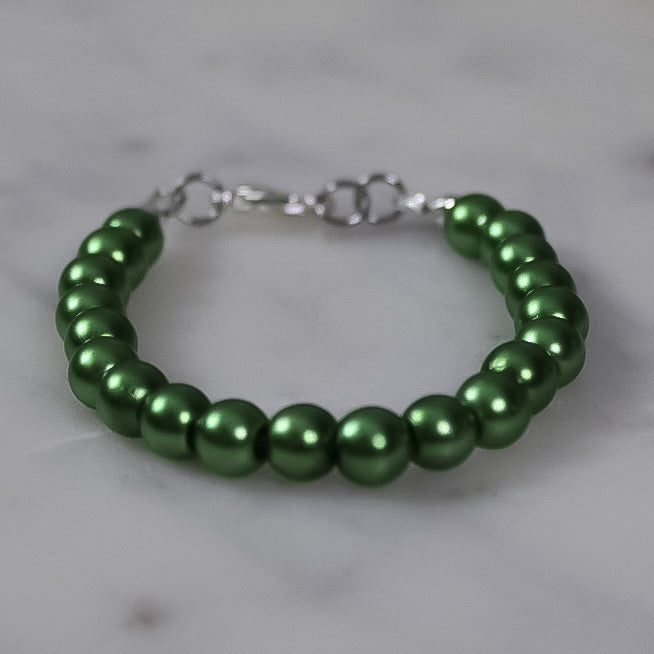 Olive green glass pearl